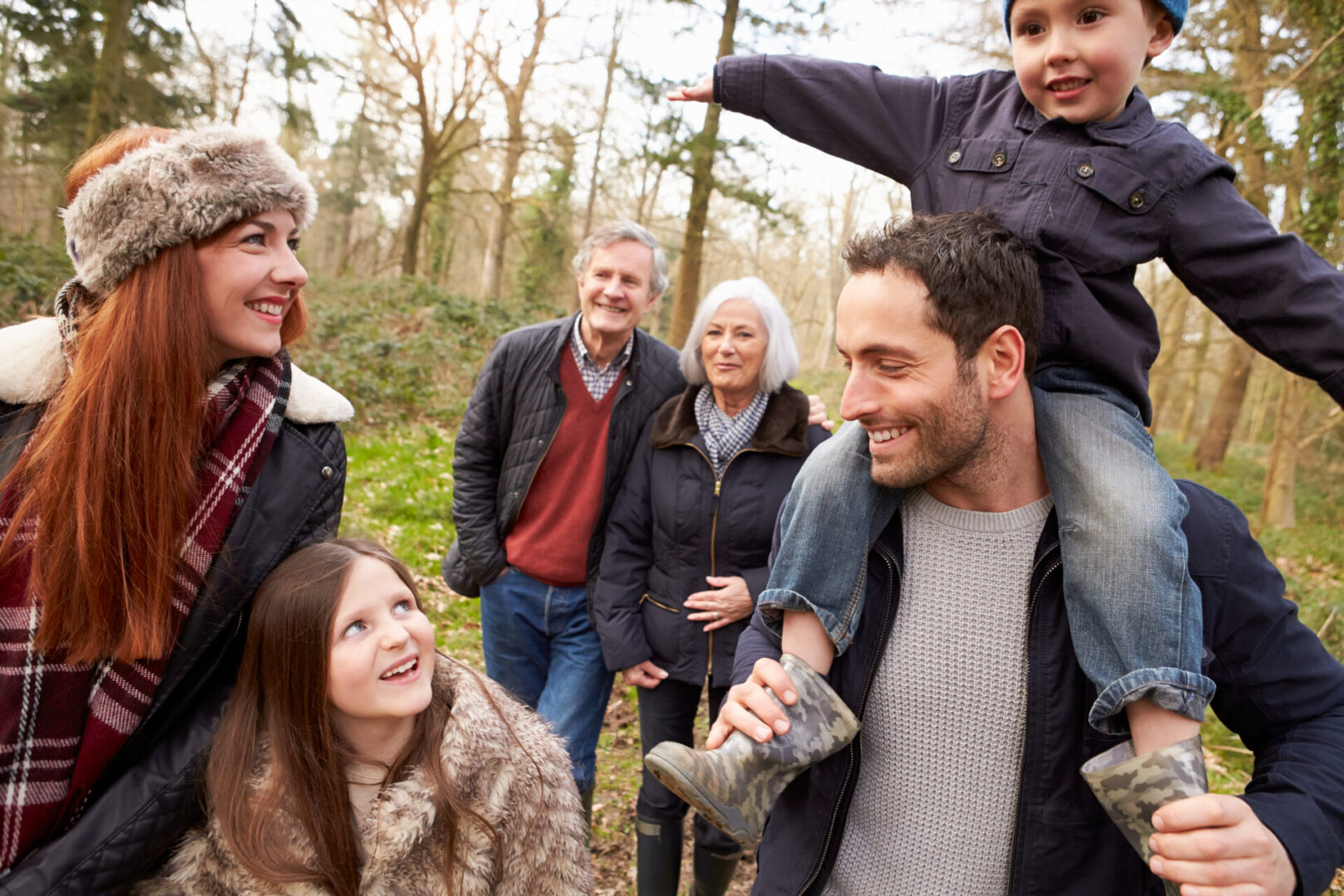 Multi-generation family walks in a countryside